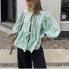 Women Y2K Peplum Puff Sleeve Shirts Teen Girls Lace Up Babydoll Ruffle Hem Blouse Tie Front Cute Summer Tops